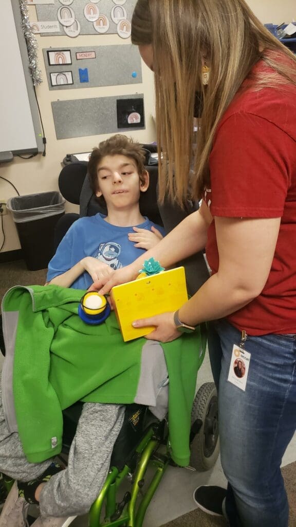 Disabled child using device made in ACCEL’s makerspace